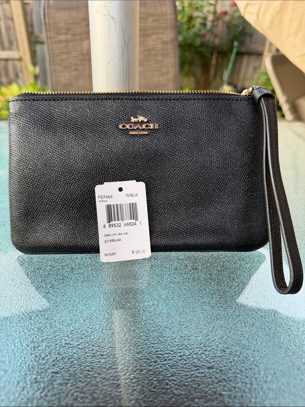 Coach Black Pebbled Leather Wristlet with Gold Hardware